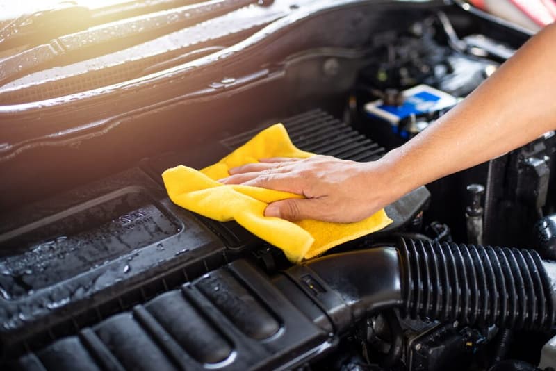 Cleaning the engine bay of a vehicle